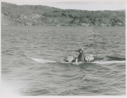 Image of Polar Eskimos [Inughuit] in kayaks coming to meet MacMillan